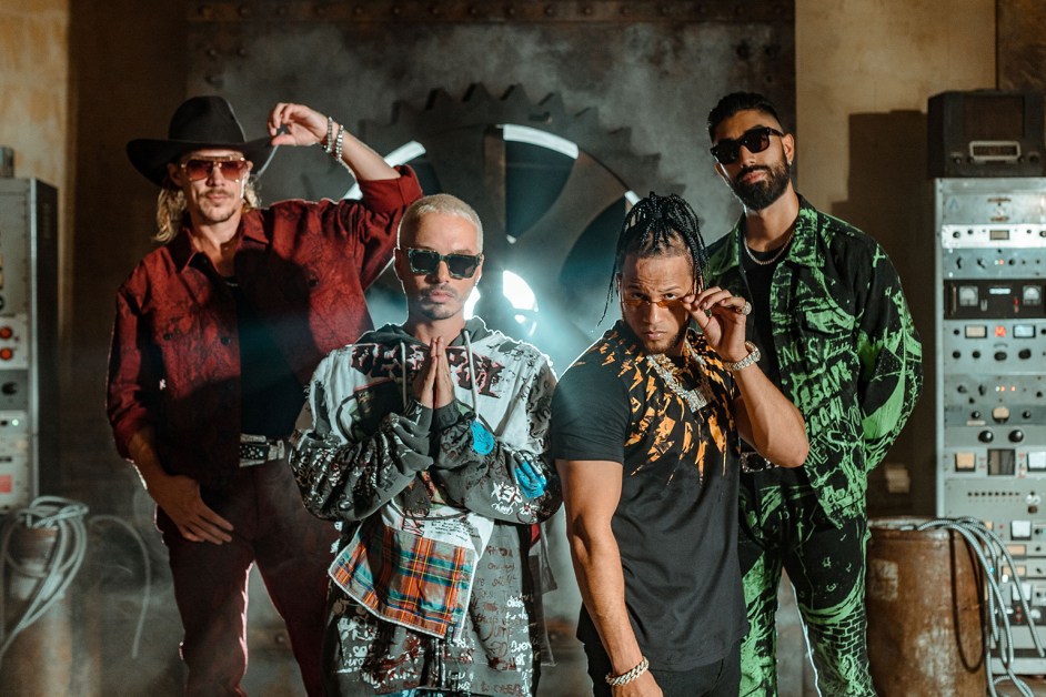 Latin musicians performing together on stage