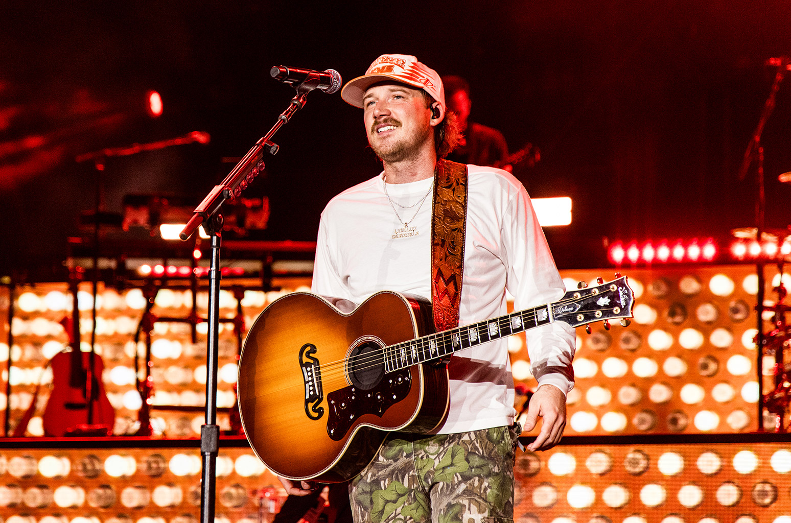 Morgan Wallen performing live on stage during recent tour