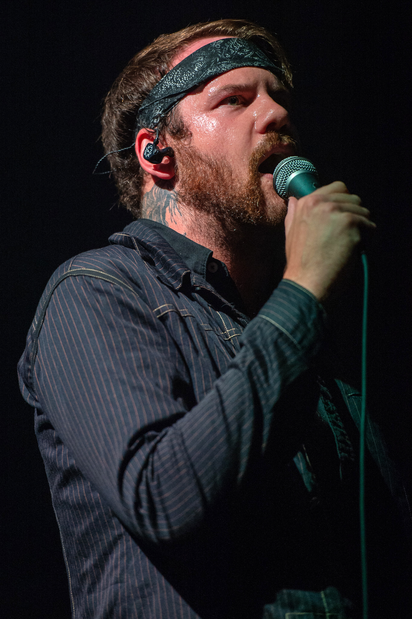 Caleb Shomo with Beartooth during their rise to prominence in the metal scene