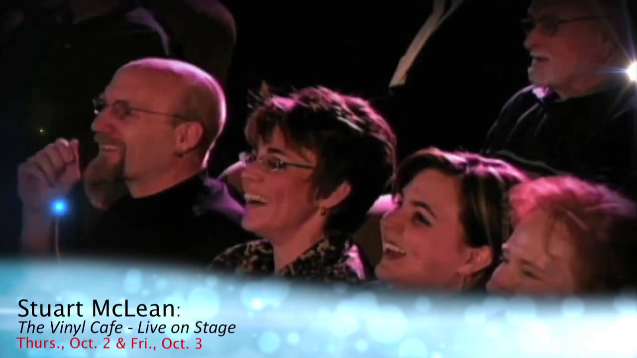 Stewart McLean performing live storytelling on stage
