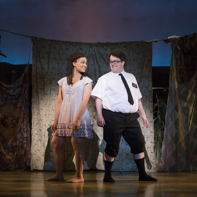 The Book of Mormon musical cast performing on Broadway