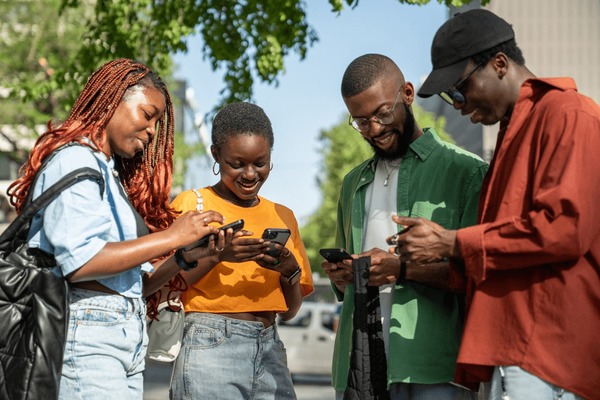 Young African adults using mobile technology