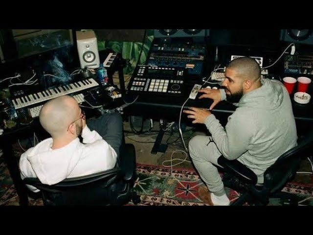 Drake working in a recording studio