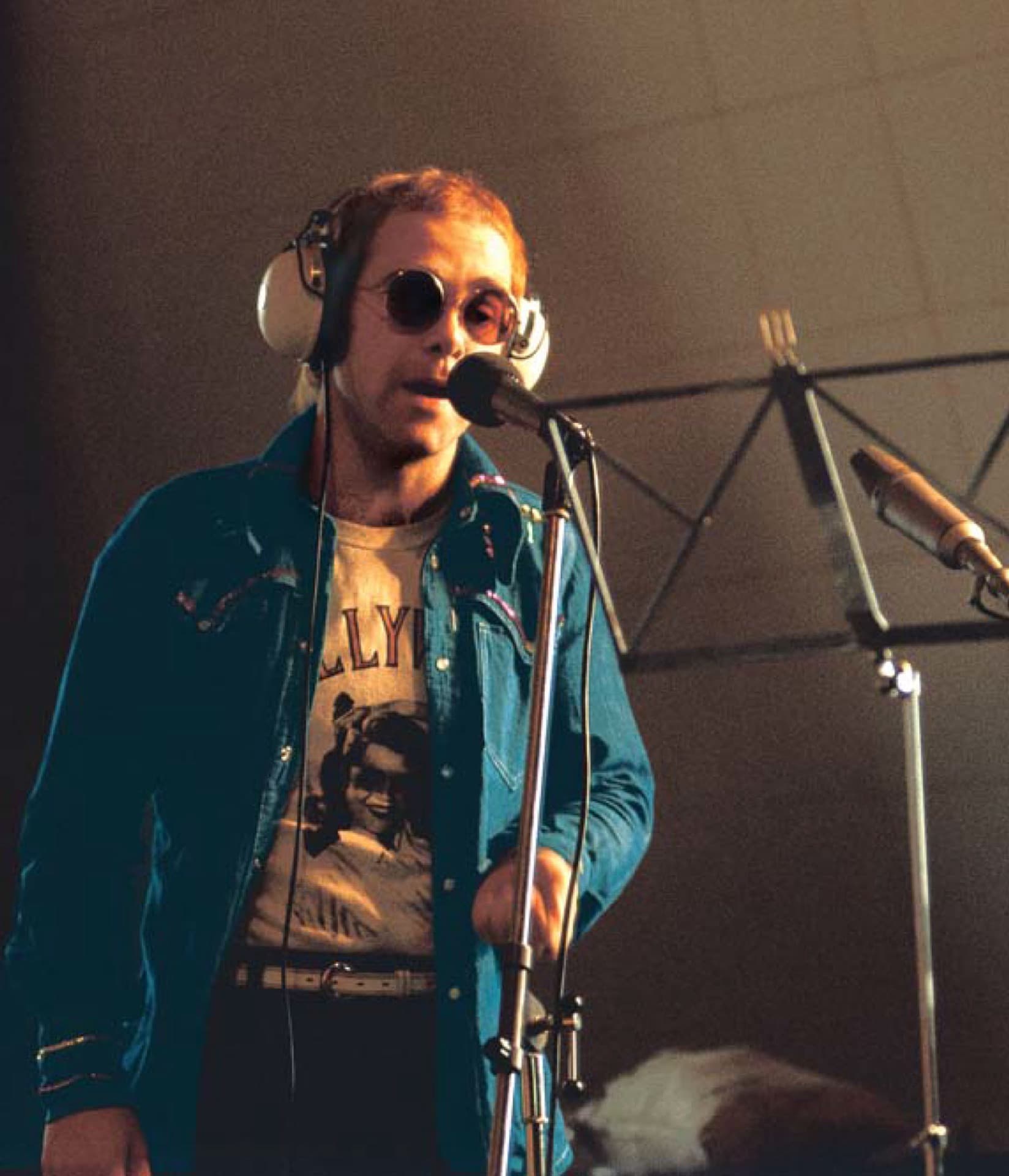 Elton John in podcast studio setting