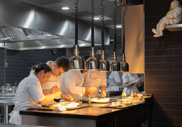 Gordon Ramsay working in professional restaurant kitchen