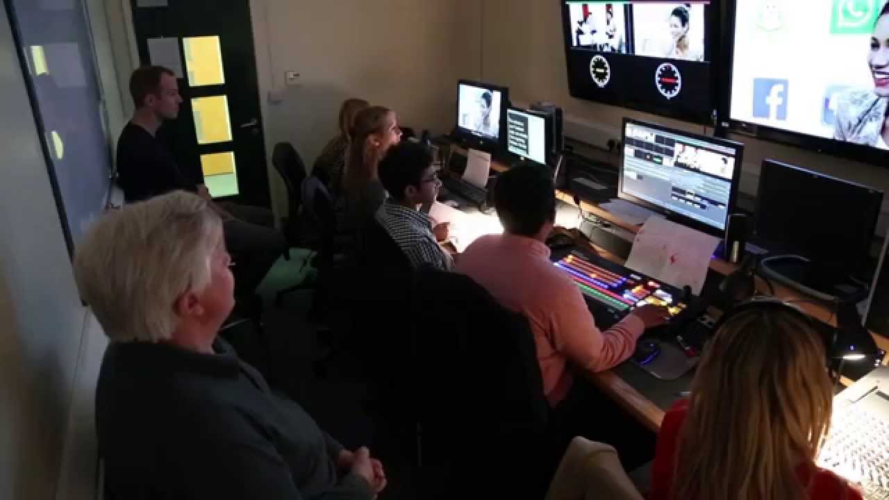Modern TV show production crew filming