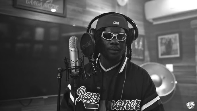 Jeriq recording music in a professional studio