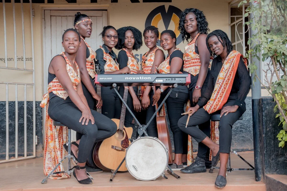 Young Africans listening to music and engaging with hip-hop culture