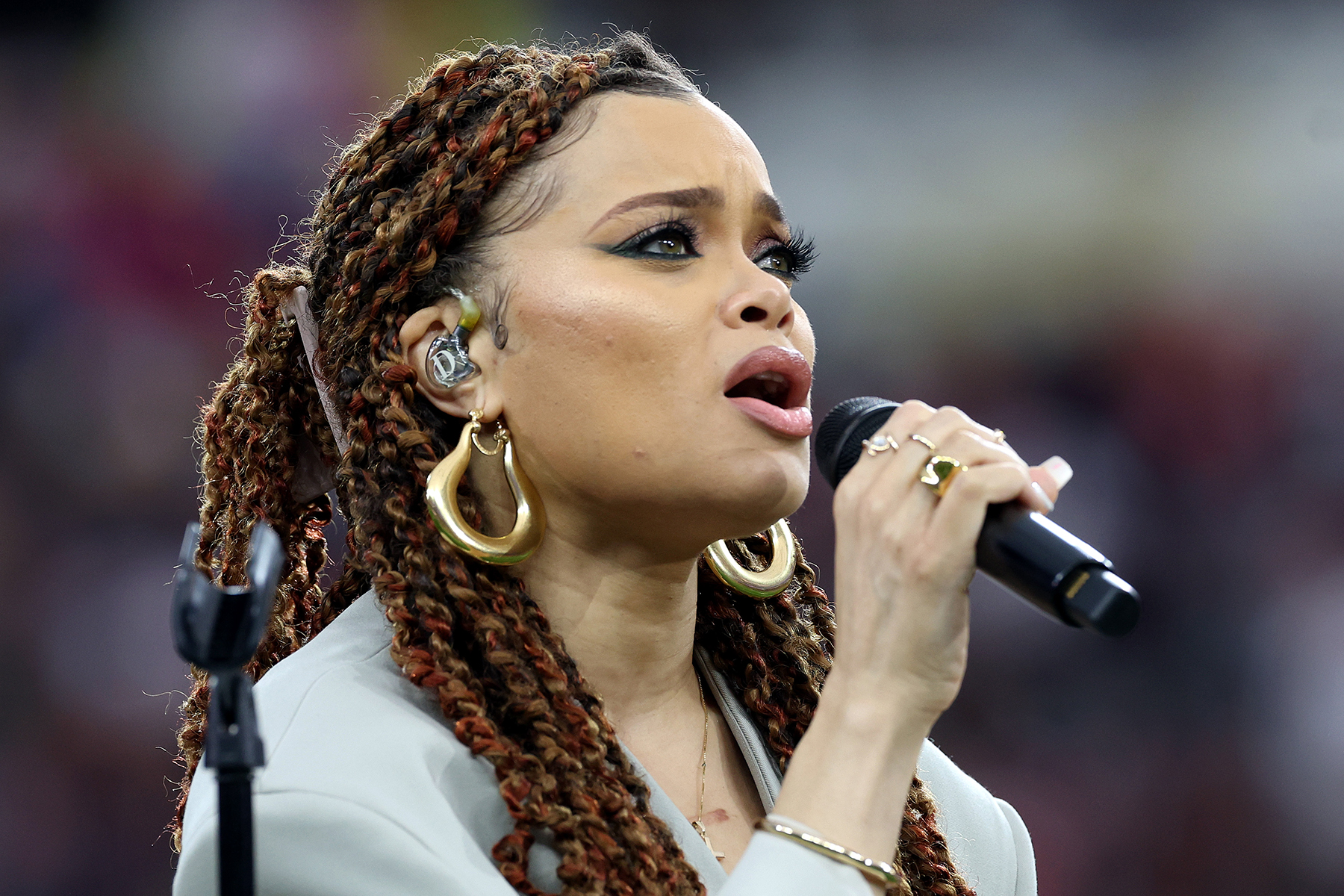 Andra Day performing on stage