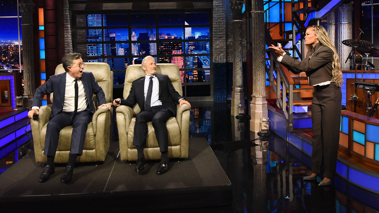 Jon Stewart surprising Stephen Colbert with musical guest