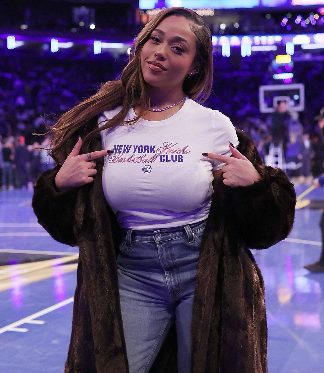 Jordyn Woods sitting courtside at NBA game
