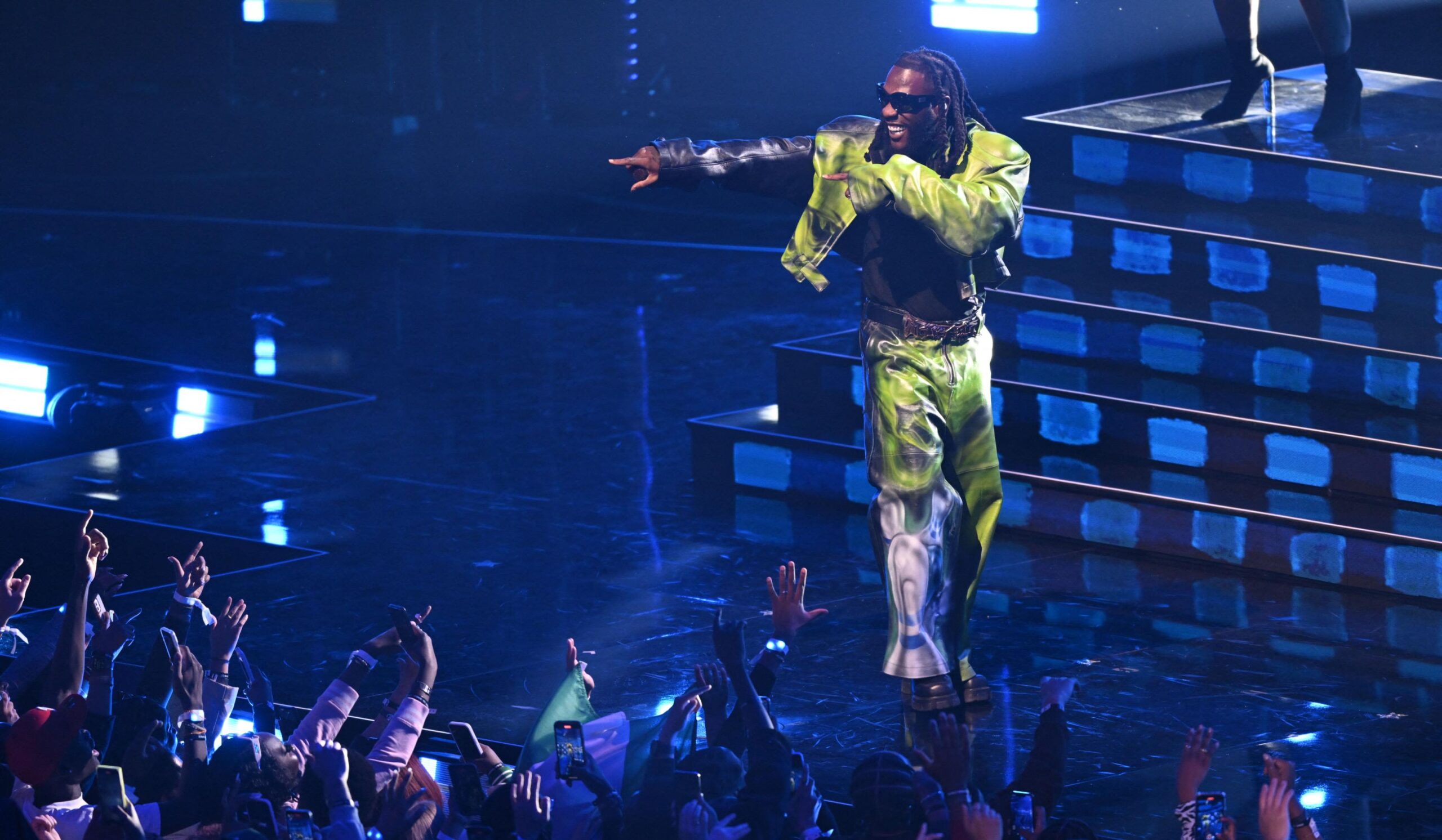 Burna Boy performing live at concert venue