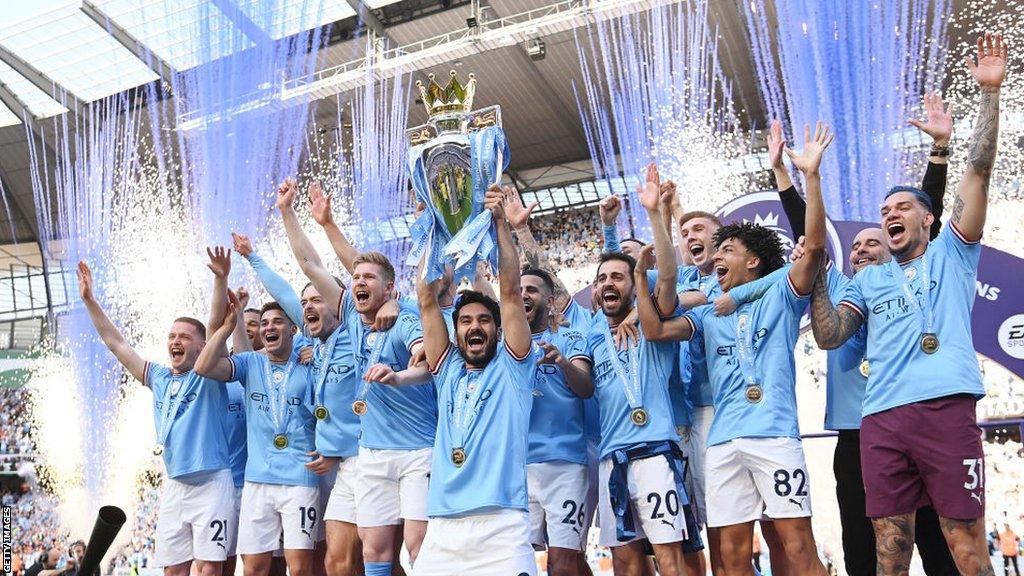 Manchester City players celebrating Premier League title victory
