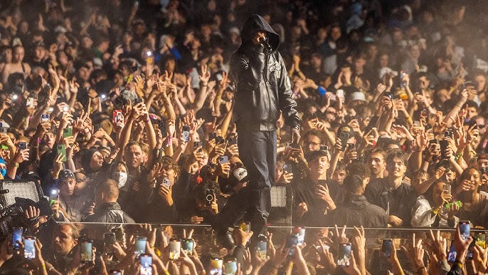 Young fans at Playboi Carti concert showing excitement