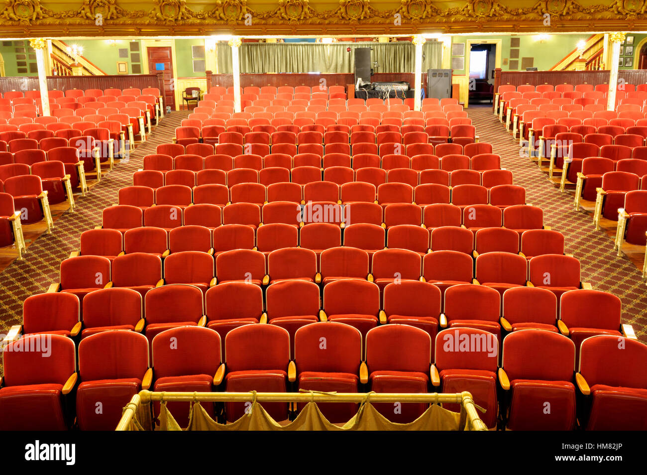 Empty concert venue showing economic impact on live music