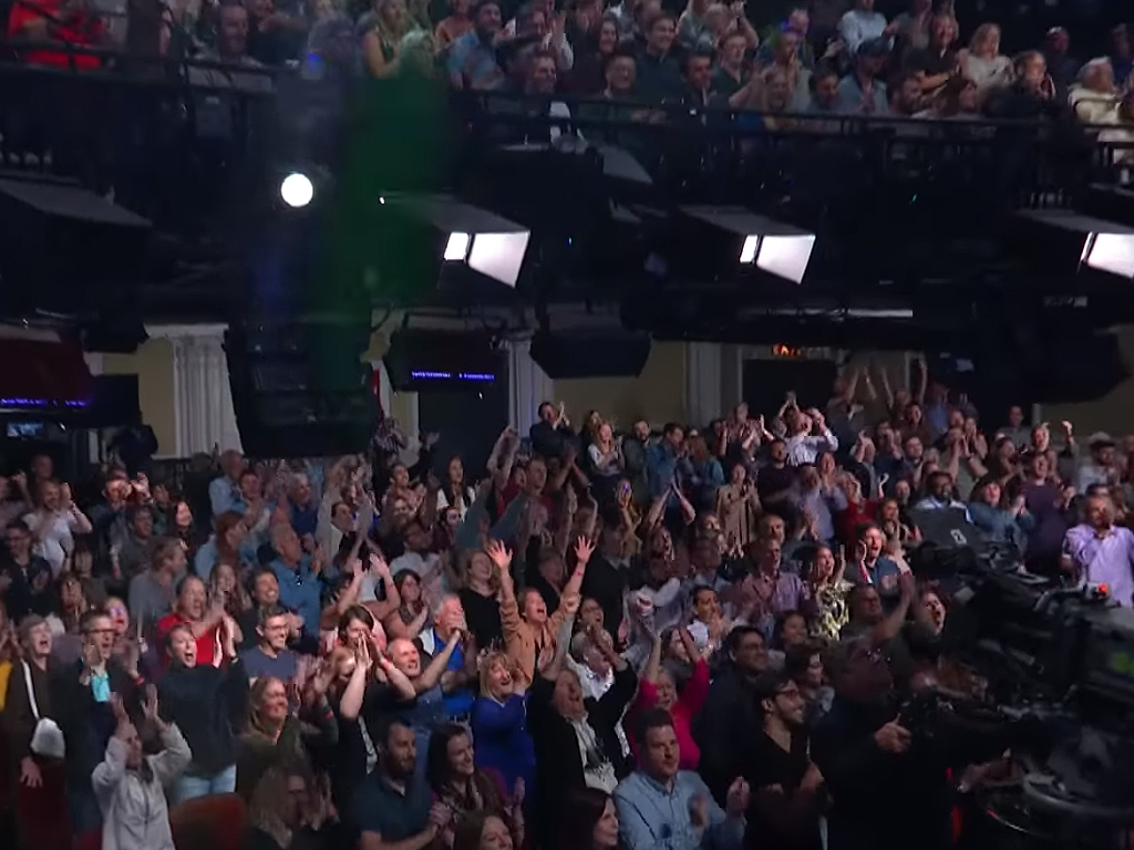 Stephen Colbert receiving applause from The Late Show audience