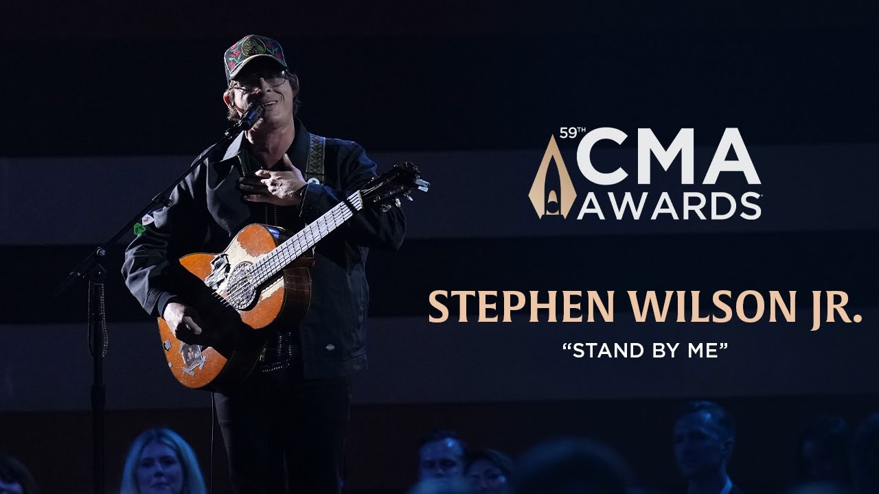 Stephen Wilson Jr. performing on stage with guitar