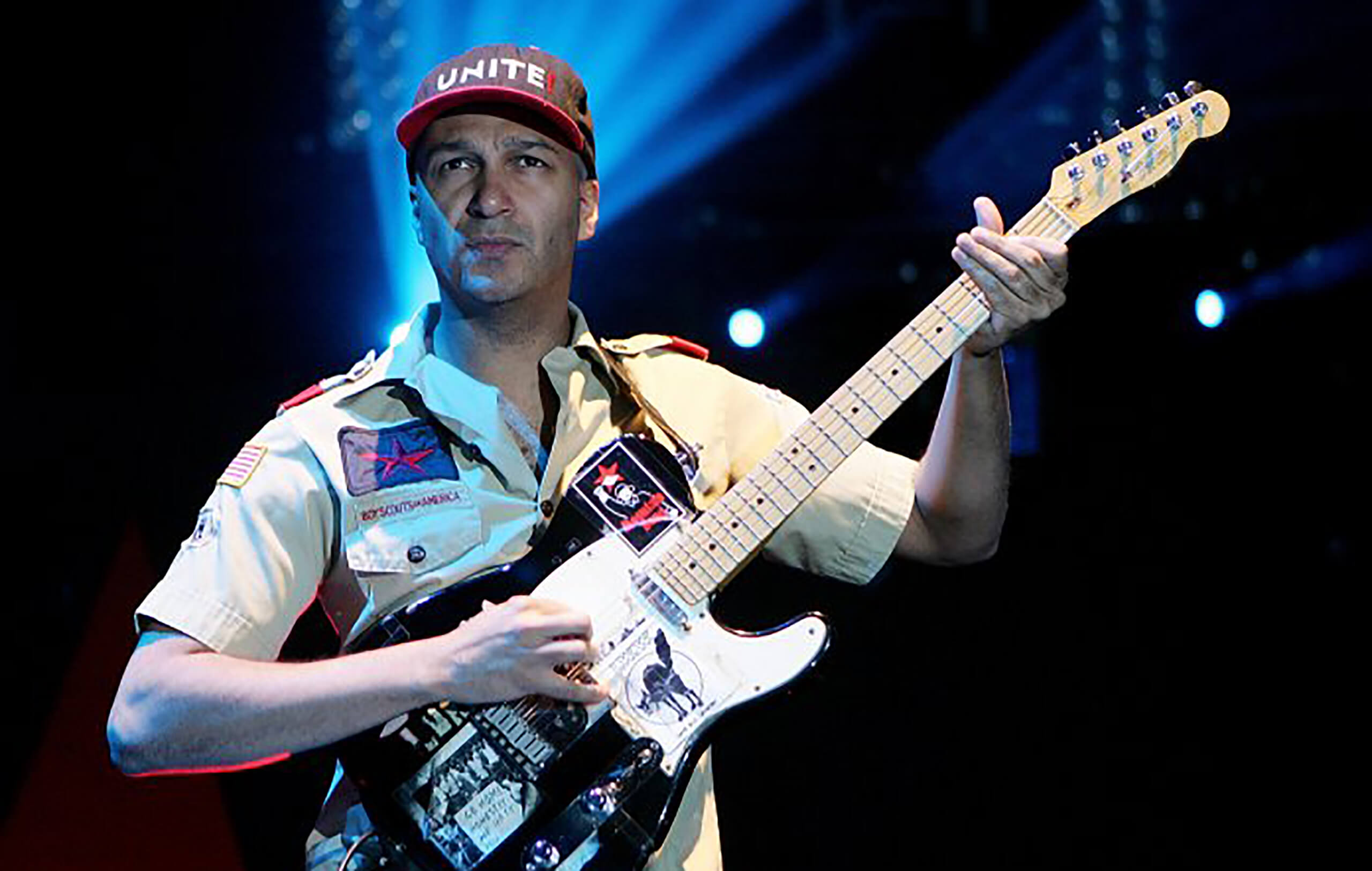 Tom Morello performing with his signature guitar