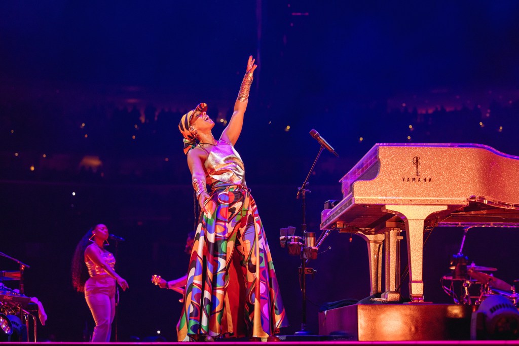 Alicia Keys performing on stage at a major live concert event