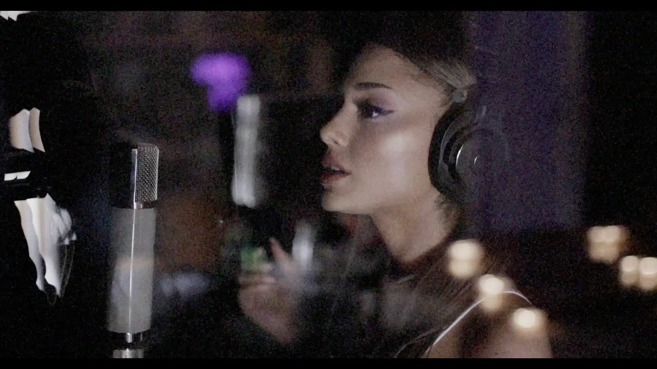 Ariana Grande working in a recording studio