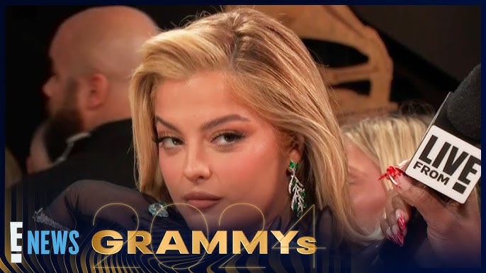 Bebe Rexha speaking at a press interview