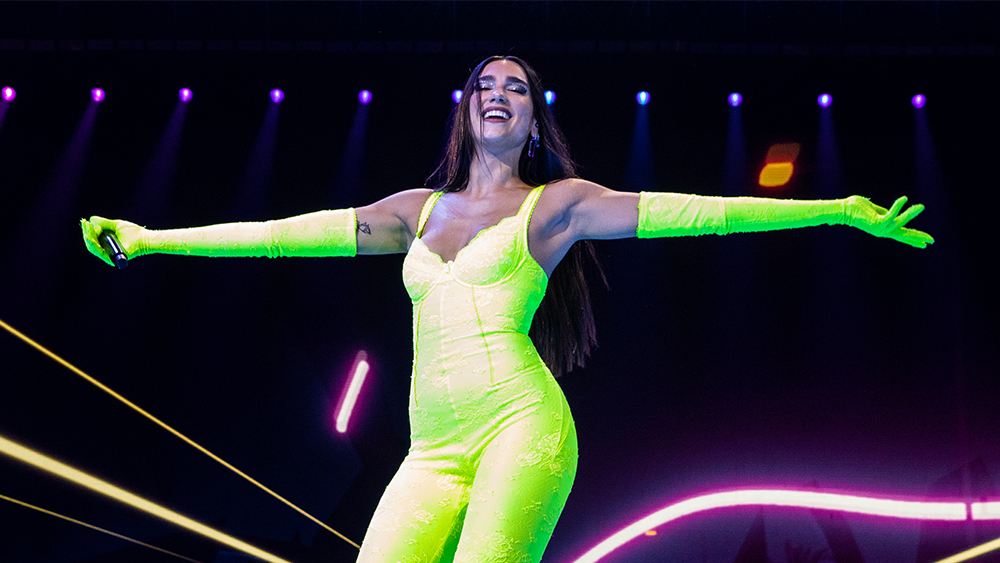 Dua Lipa performing during her 