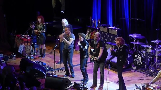 Bruce Springsteen and Roseanne Cash performing together on stage