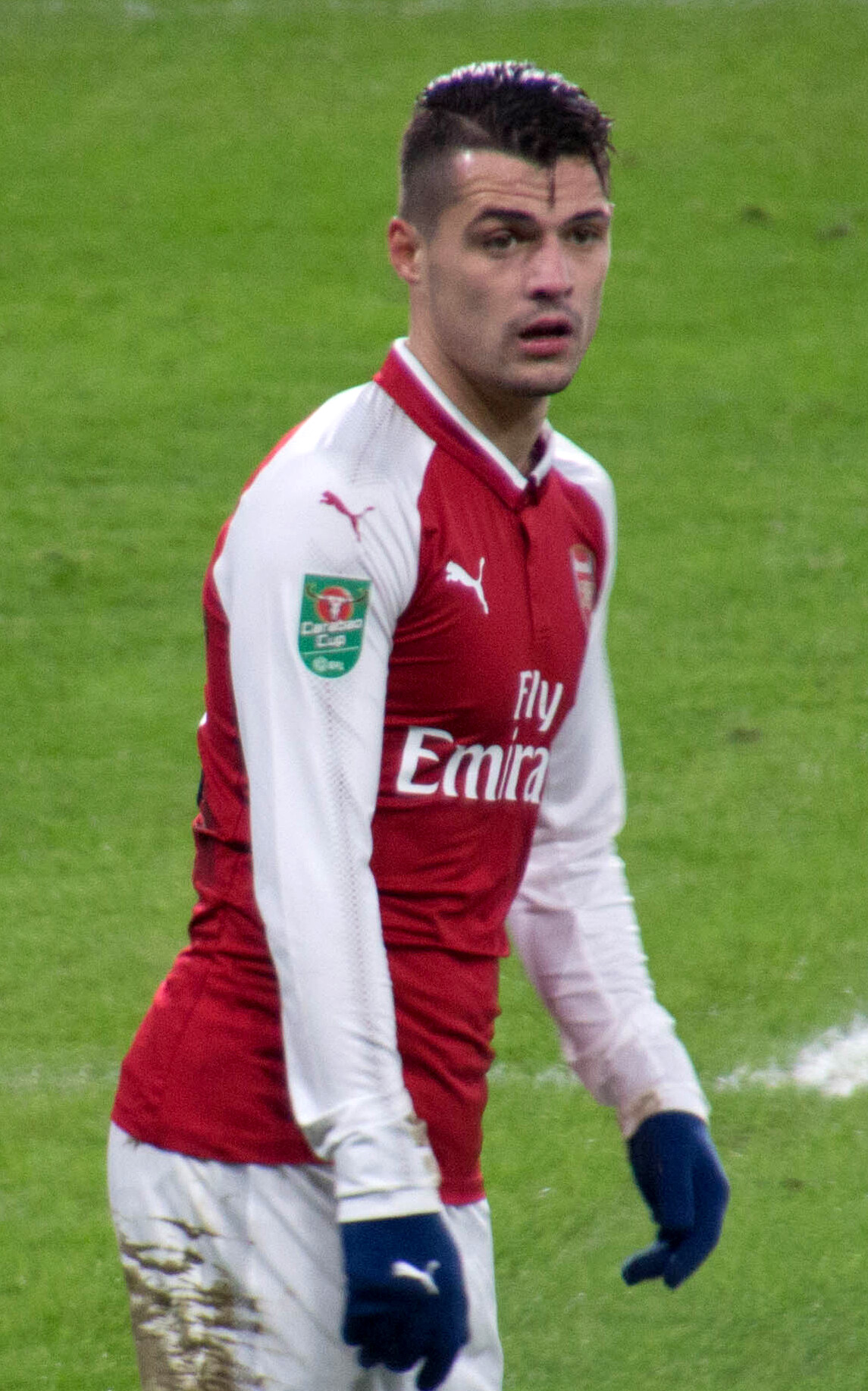 Granit Xhaka wearing Arsenal jersey during Premier League match