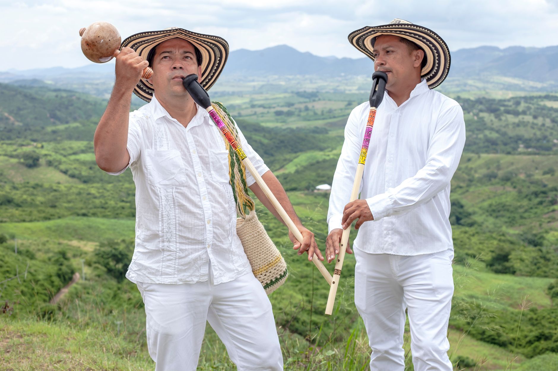 Colombian music artists Juanes Carlos Vives and Fonseca at a panel discussion