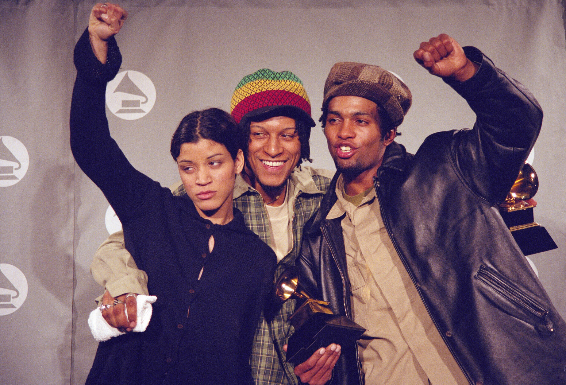 Digable Planets performing on stage together