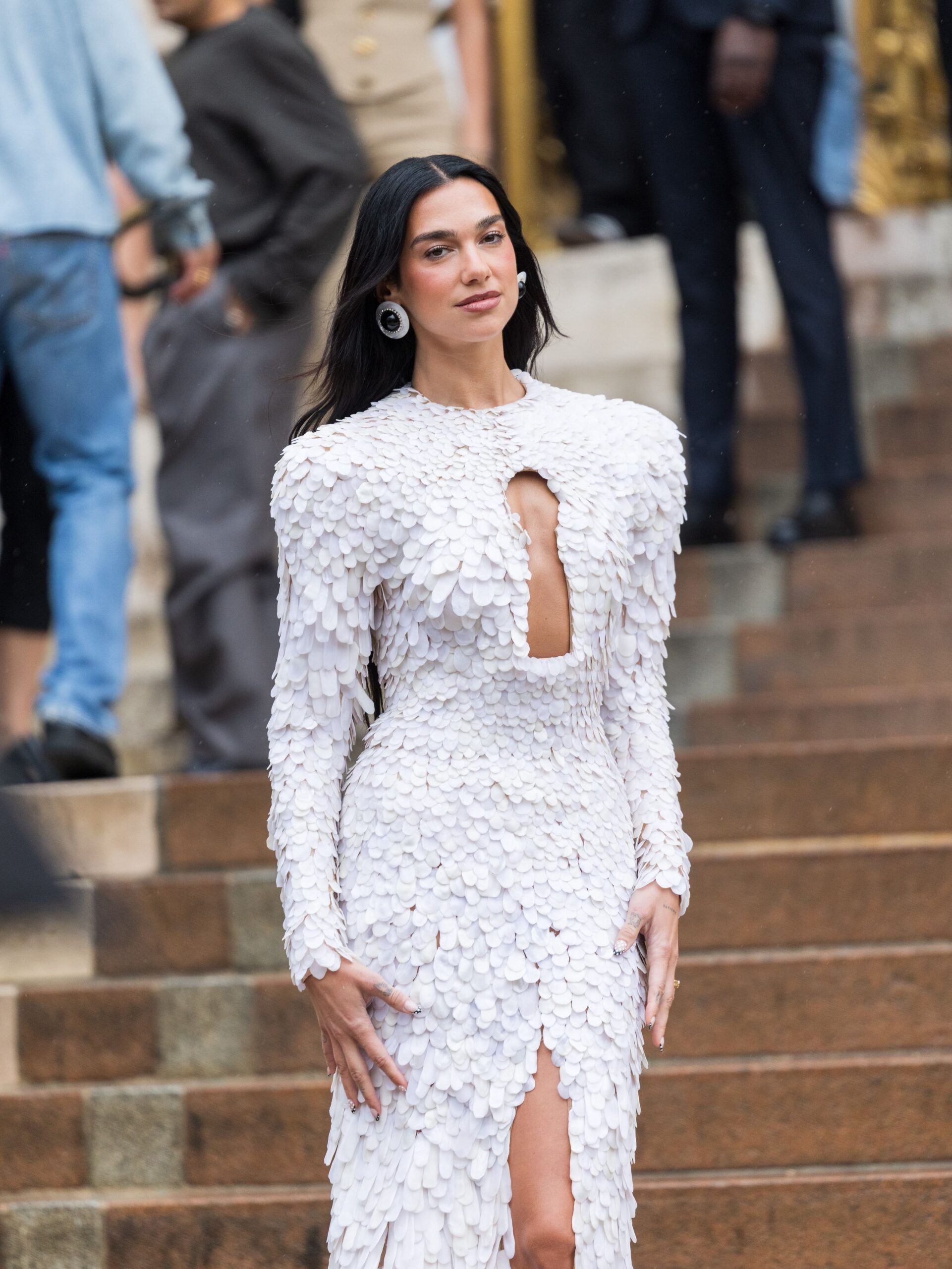 Dua Lipa wearing elegant wedding attire