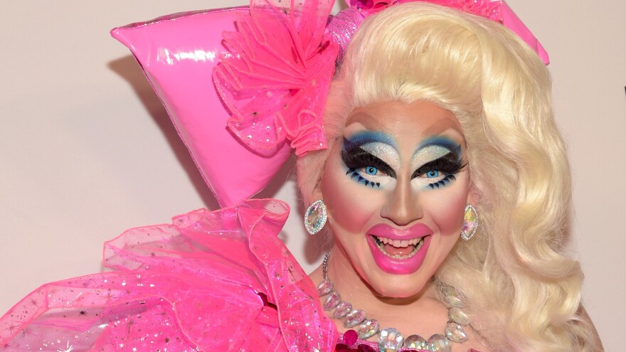 Trixie Mattel performing in full drag makeup and costume