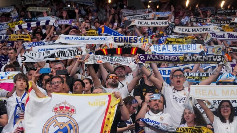 Real Madrid supporters celebrating at Santiago Bernabéu stadium