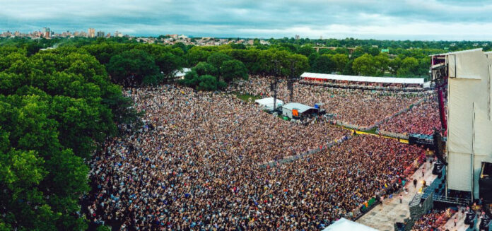 Festival crowd enjoying the final sunset performance of the weekend