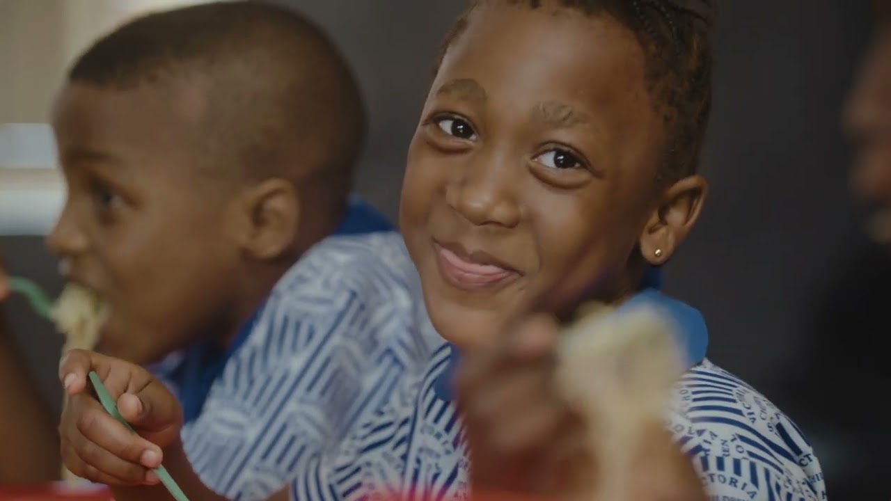 Children participating in educational activities at Indomie's Children's Day event