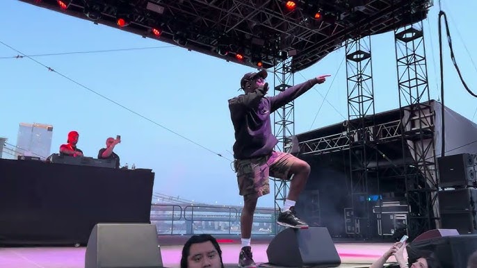 Isaiah Rashad performing on stage during a live concert