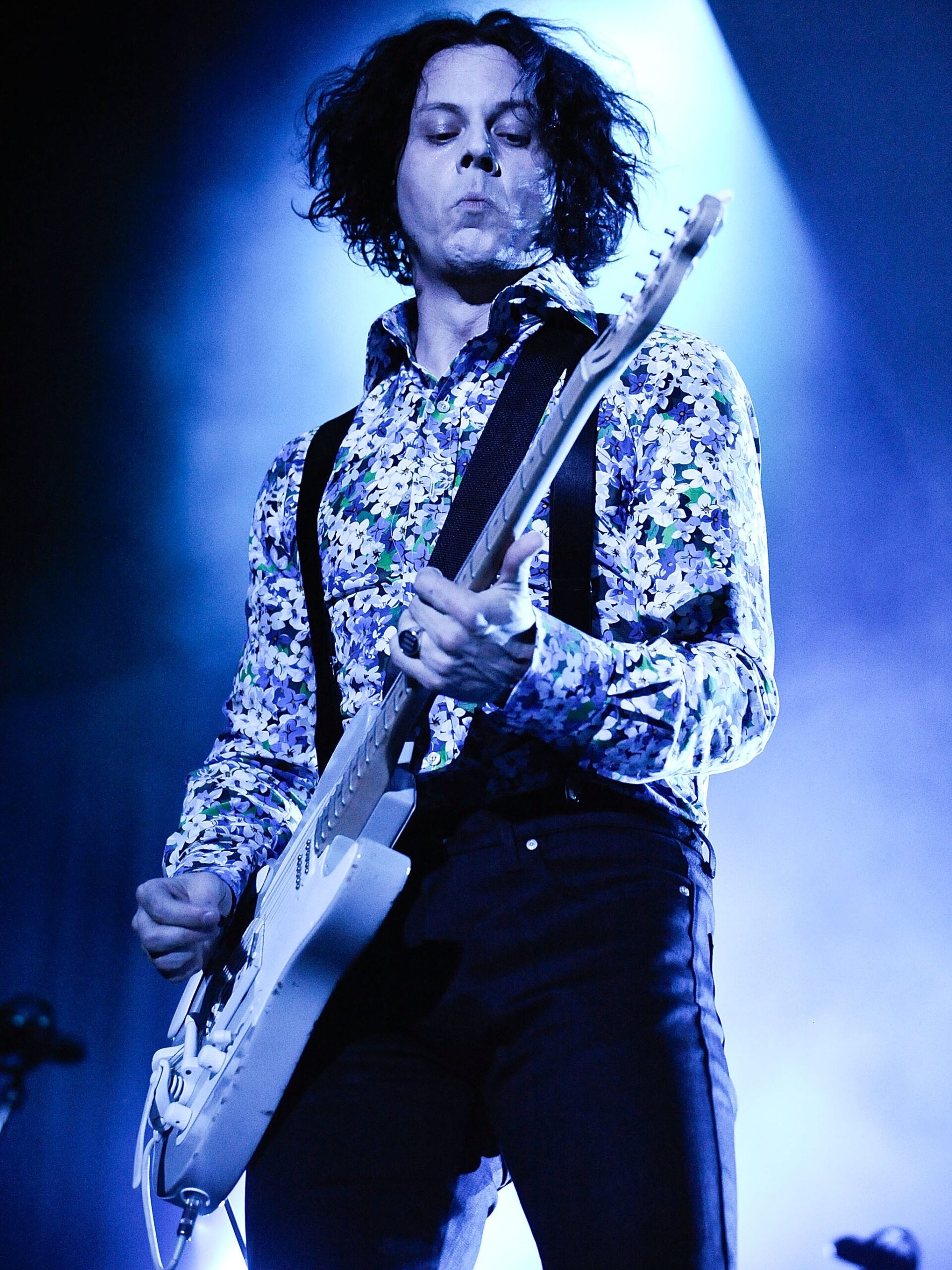 Jack White performing live with guitar