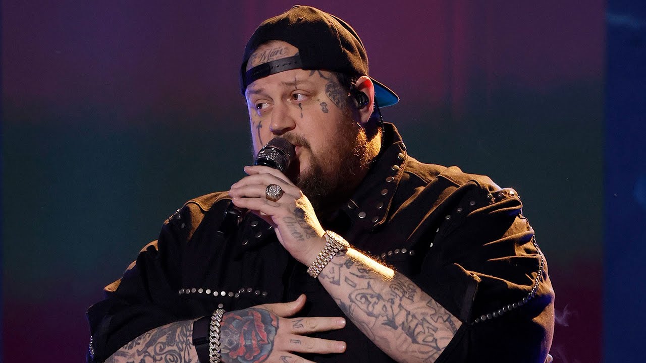 Jelly Roll performing live at a country music concert