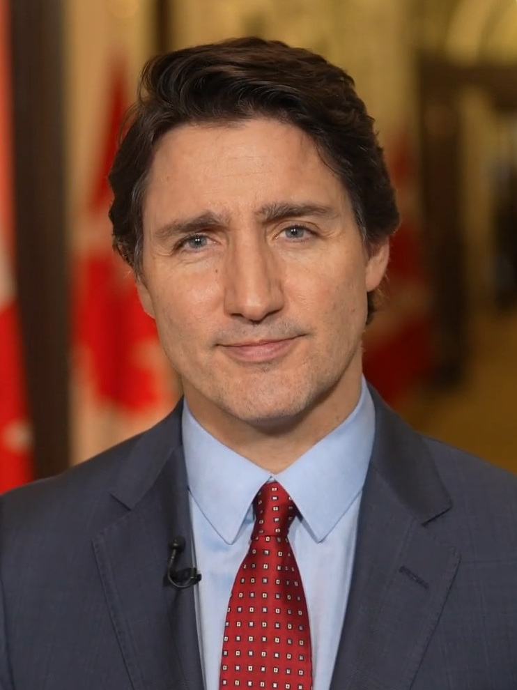 Justin Trudeau at political podium as former Canadian Prime Minister