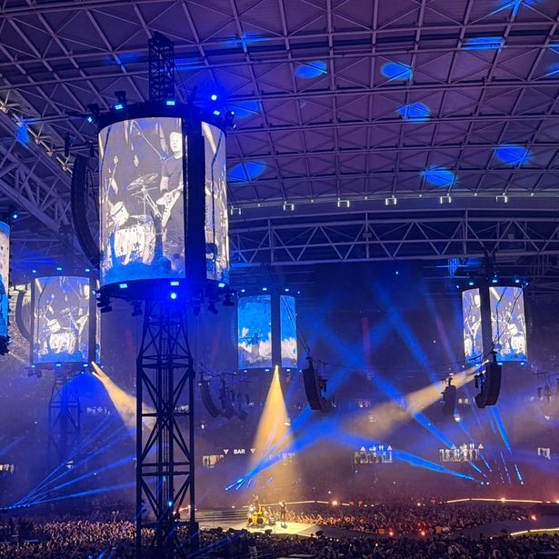 Metallica performing on stage during their Cardiff concert