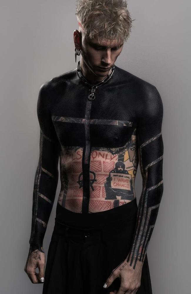 MGK Opens Up About Painful Reality Behind His Massive 'Dark Mode' Blackout Tattoo Transformation