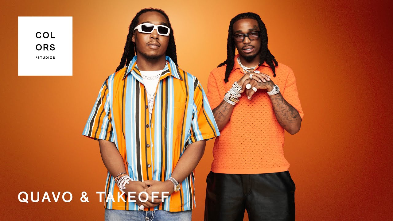 Quavo performing with Migos on stage