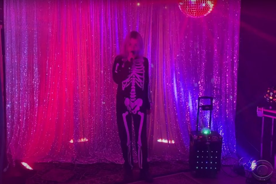 Phoebe Bridgers fans wearing skeleton suits at a concert