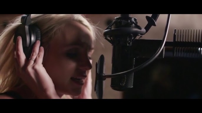 Pop star Britney Spears recording vocals in professional studio