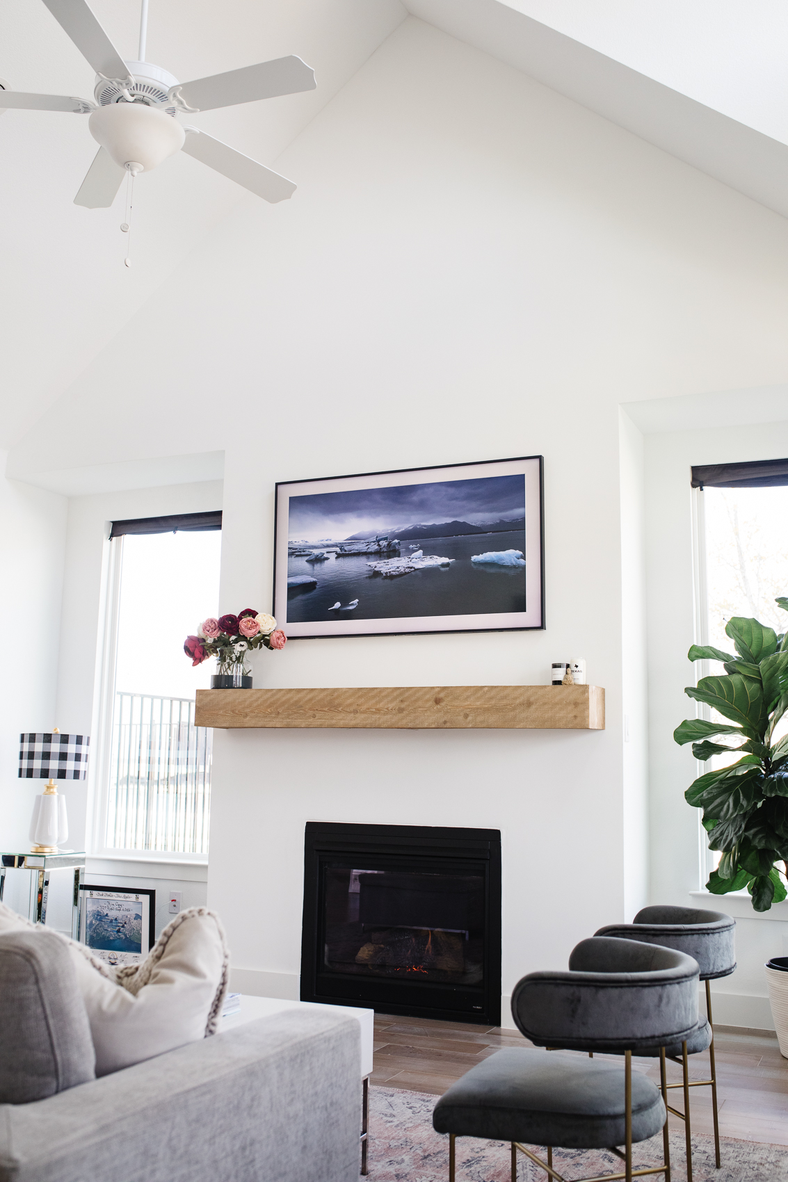 Samsung Frame TV mounted on a wall displaying artwork