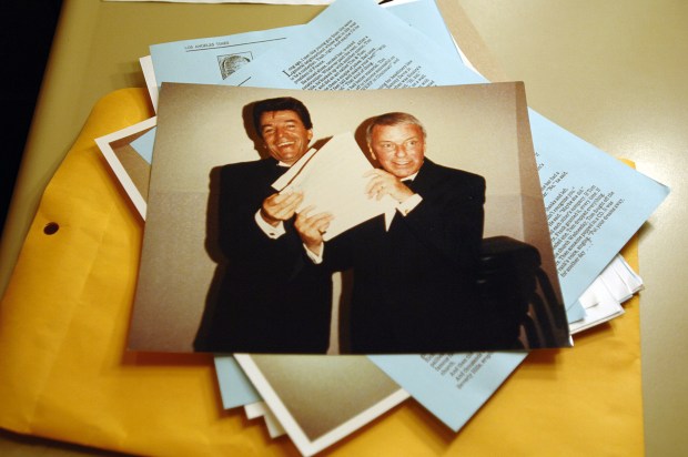 Tom Dreesen and Frank Sinatra performing together