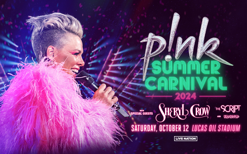 P!nk performing on stage with her signature aerial acrobatics