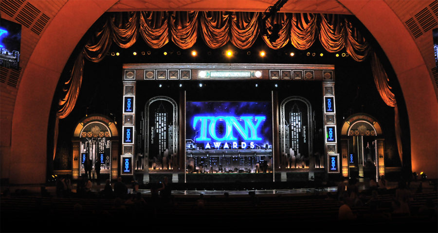 Broadway theater district with Tony Awards signage and lighting