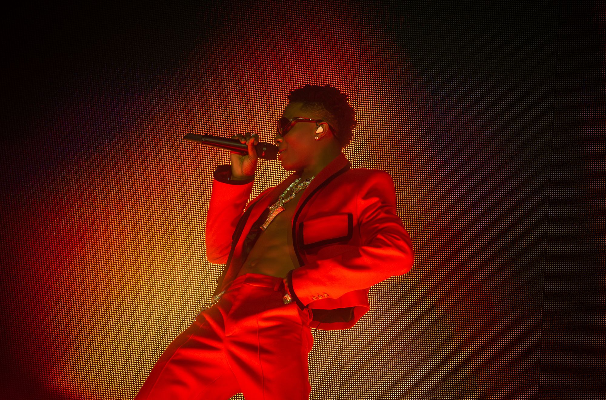 Wizkid performing at an Afrobeats concert