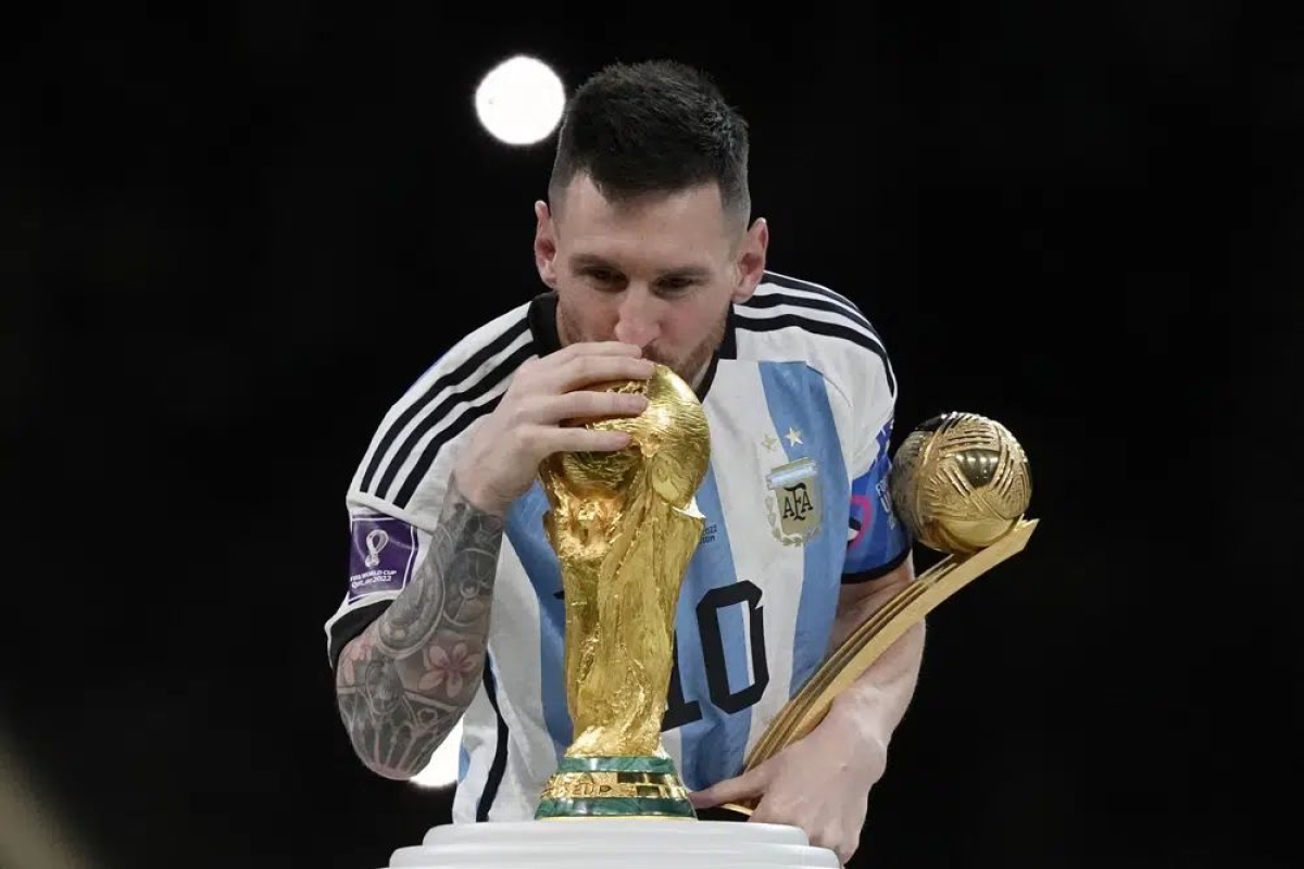 Messi lifting the FIFA World Cup trophy in Qatar 2022